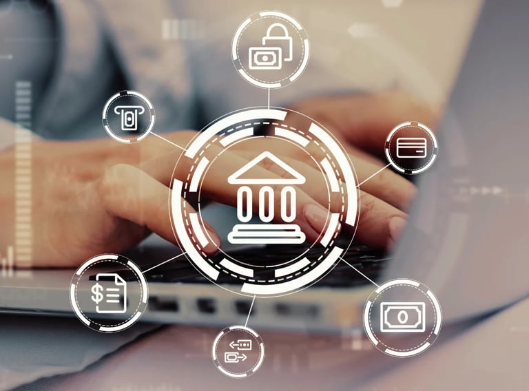 Hand touching digital banking interface with financial icons and bank building symbol on laptop screen